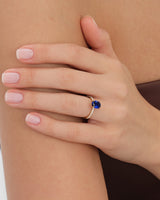 Sidestone Accent Oval Gemstone Engagement Ring