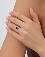 Sidestone Accent Oval Gemstone Engagement Ring