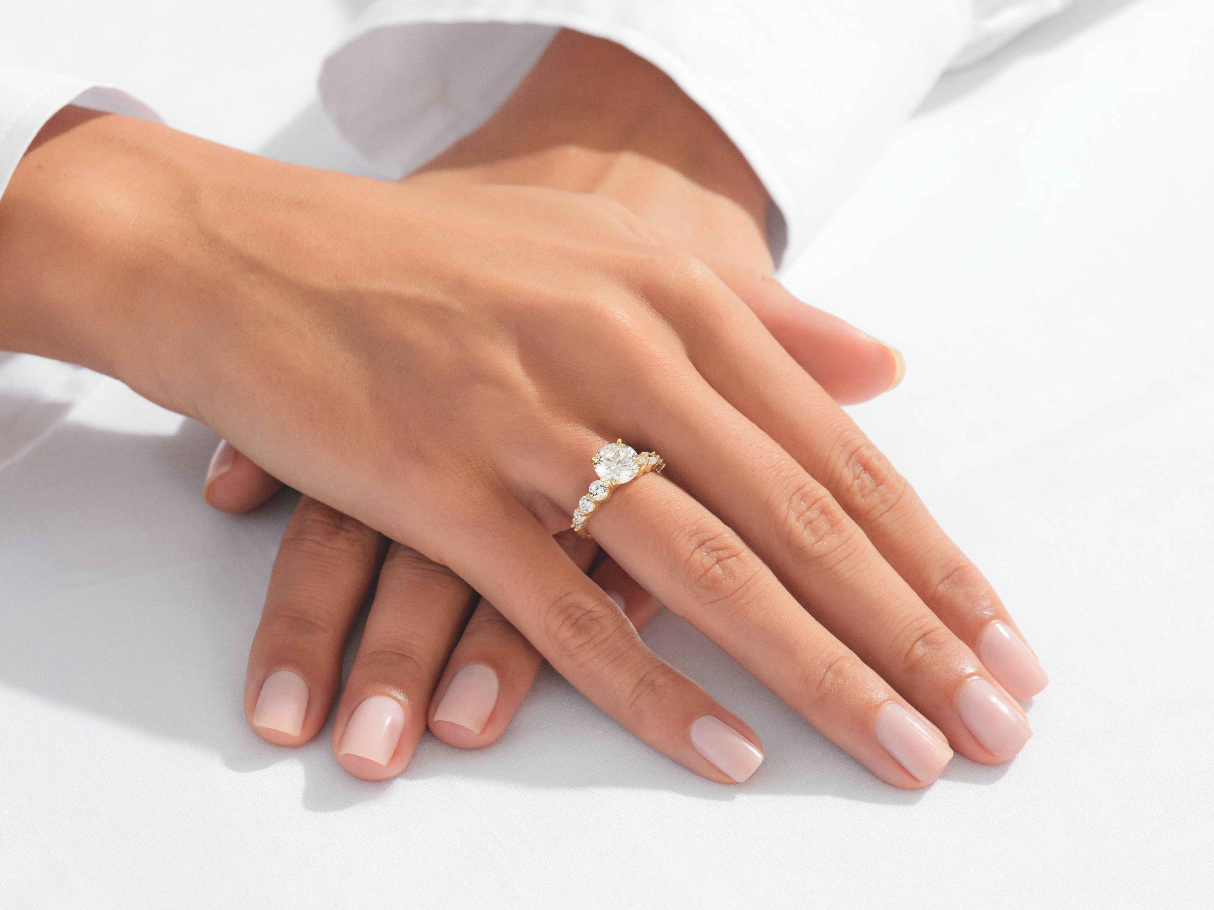 Shared Double Prong Round Moissanite Engagement Ring