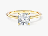 Gold ring with cushion cut diamond engagement ring