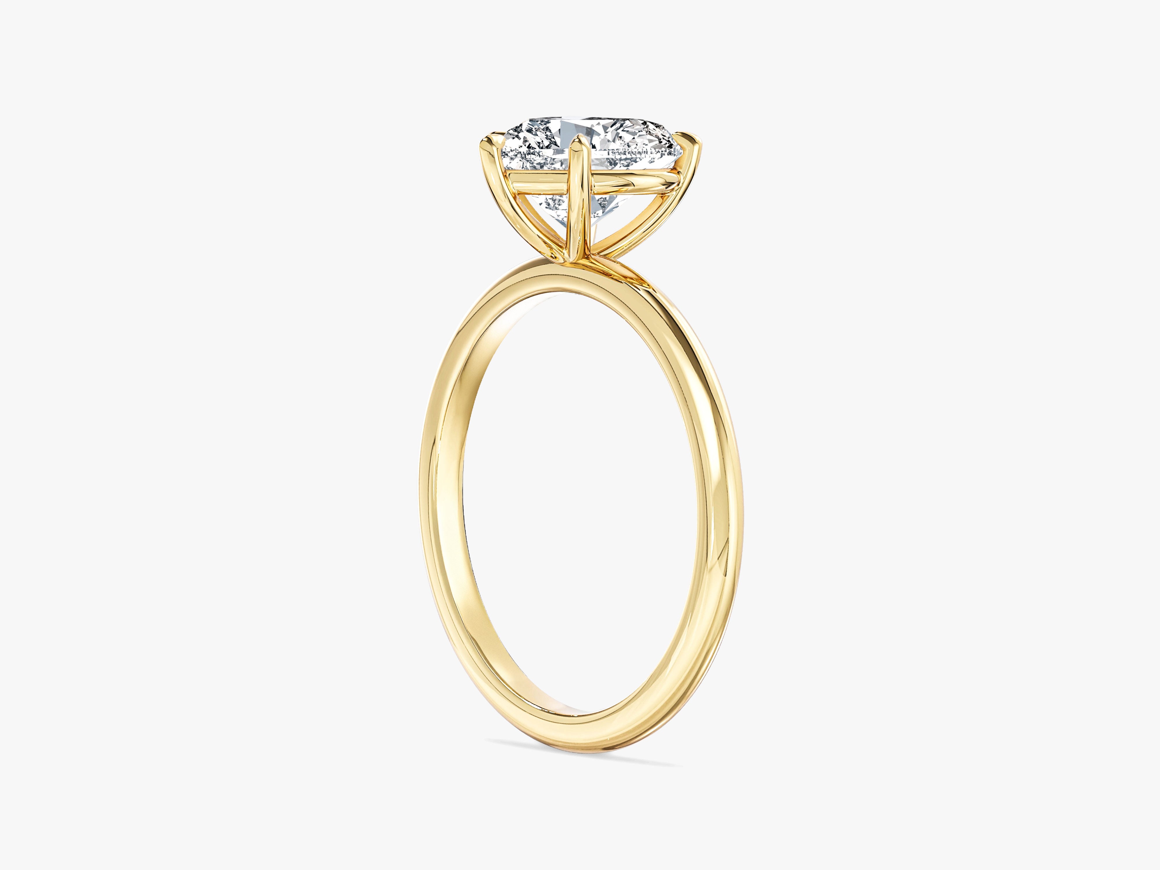 Gold ring with a heart diamond engagement ring