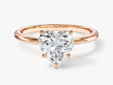 Rose gold ring with heart-shaped diamond engagement ring