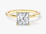 Gold ring with princess cut diamond engagement ring