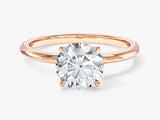 Rose gold engagement ring with a brilliant cut diamond