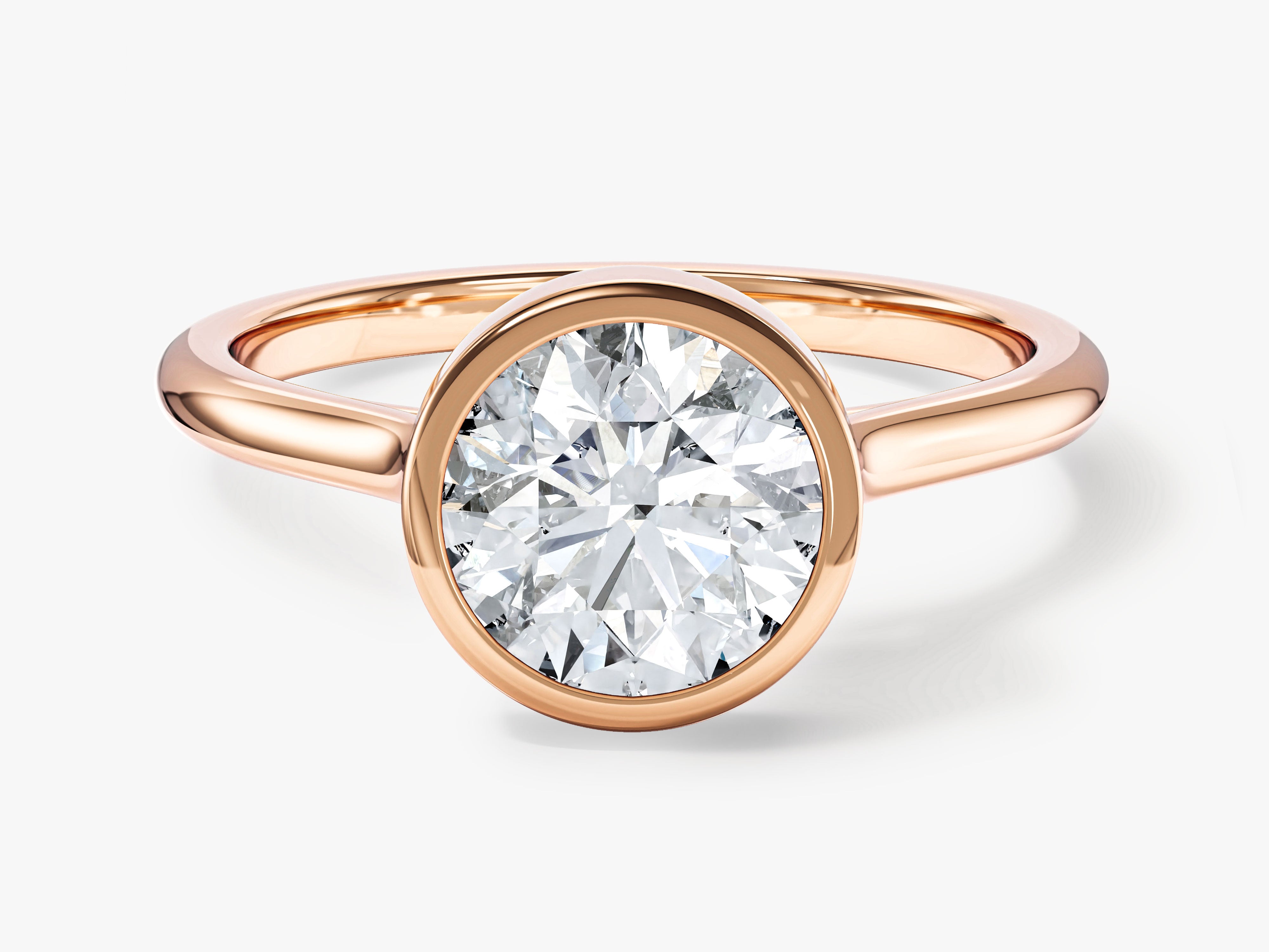 Rose gold bezel set diamond engagement ring