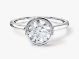 Oval diamond bezel set engagement ring from jewelry company