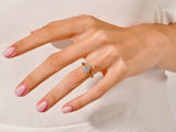 Diamond engagement ring on a woman's hand, fine jewelry