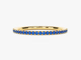 Gold eternity band with blue sapphires, fine jewelry