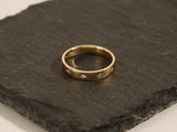 Gold ring with diamonds on slate, jewelry for sale