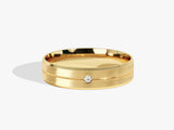 Gold wedding band with diamond accent, brushed finish, jewelry