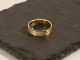 Gold ring with diamonds on slate, jewelry for sale