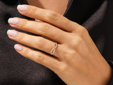 Diamond infinity ring on a woman's hand