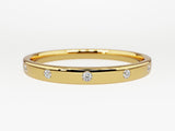 Gold band ring with scattered diamonds, fine jewelry