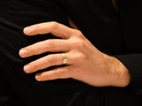 Men's gold wedding band with brushed finish, jewelry