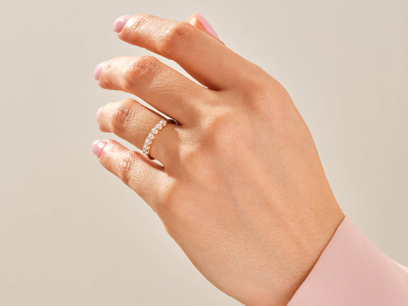 Diamond band ring on a hand, fine jewelry for women