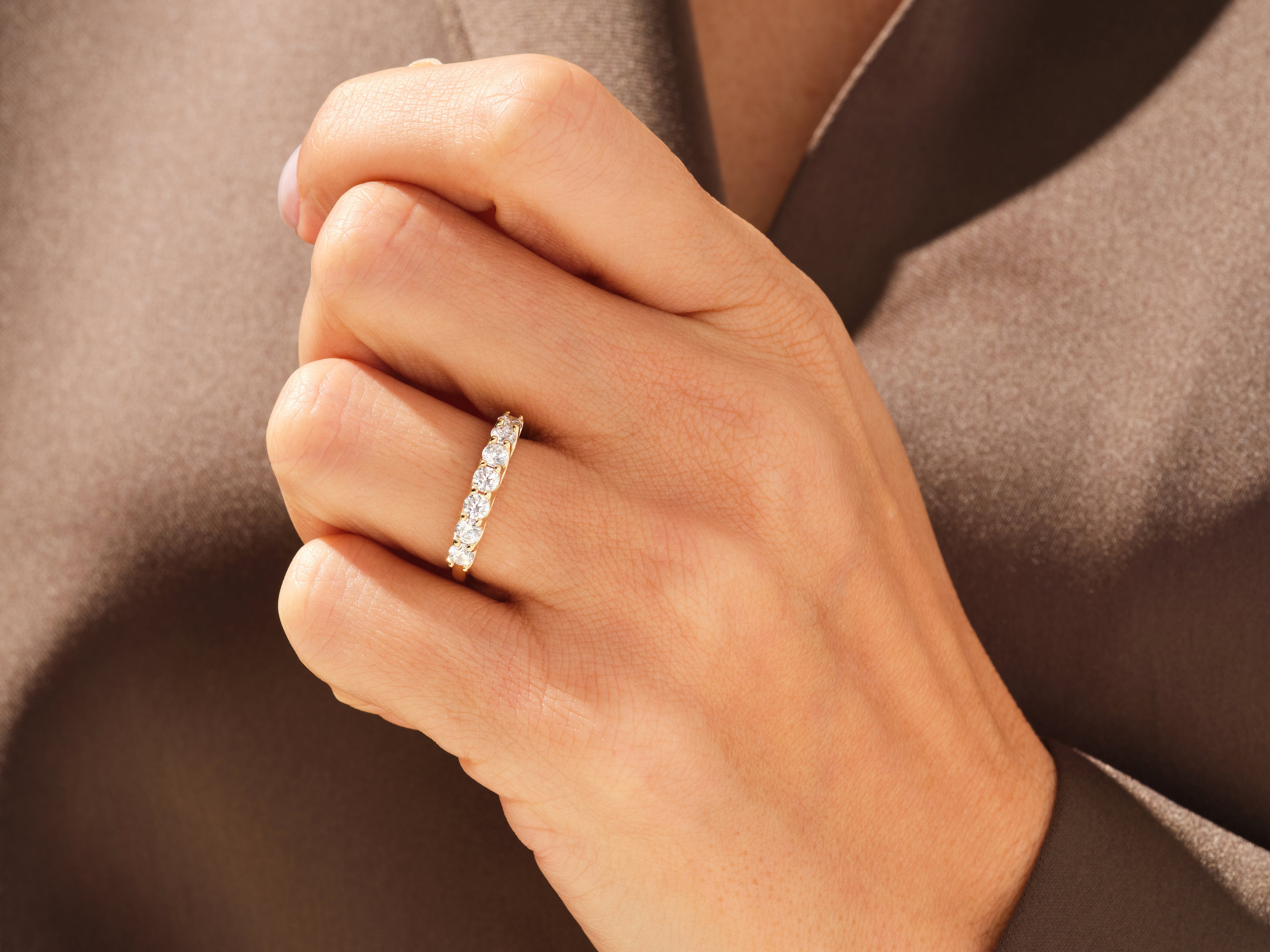 Diamond eternity band on hand, fine jewelry for her