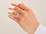 Gold diamond band ring on a woman's hand