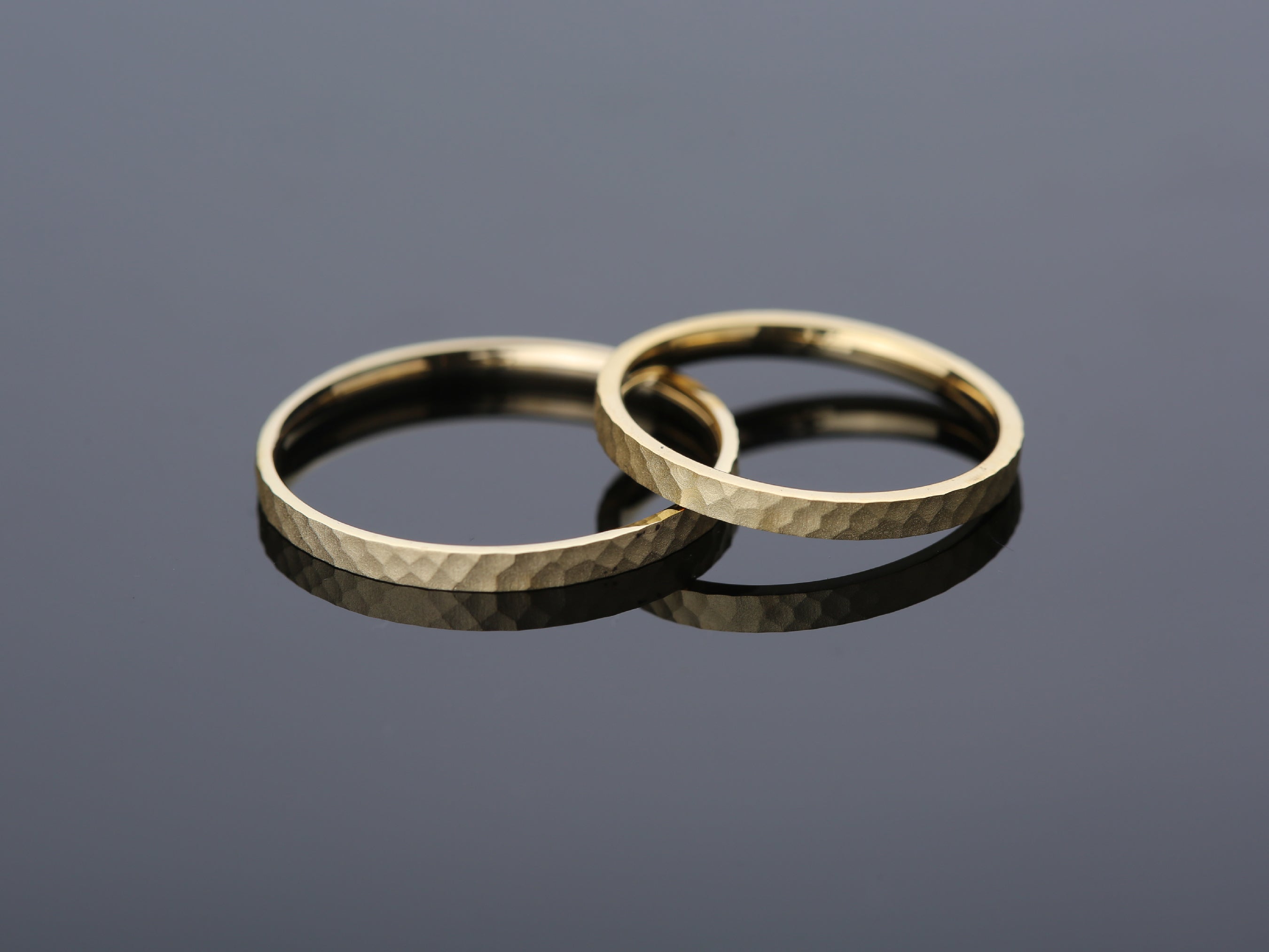 Hammered gold wedding bands from jewelry firm