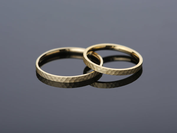 Hammered gold wedding bands from jewelry firm