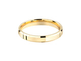 Gold wedding band with faceted edges, jewelry firm product