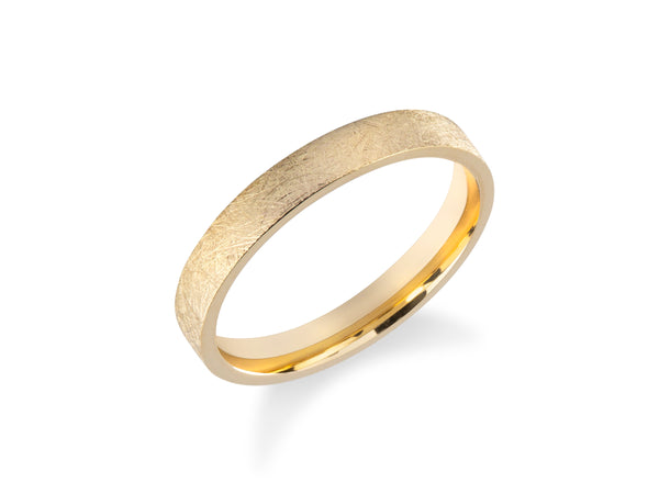 Textured gold wedding band from jewelry company