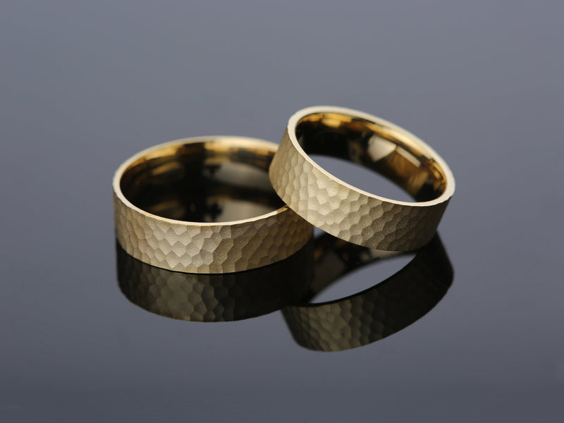 Hammered gold wedding bands from jewelry company