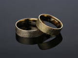 Textured gold wedding bands from a jewelry company