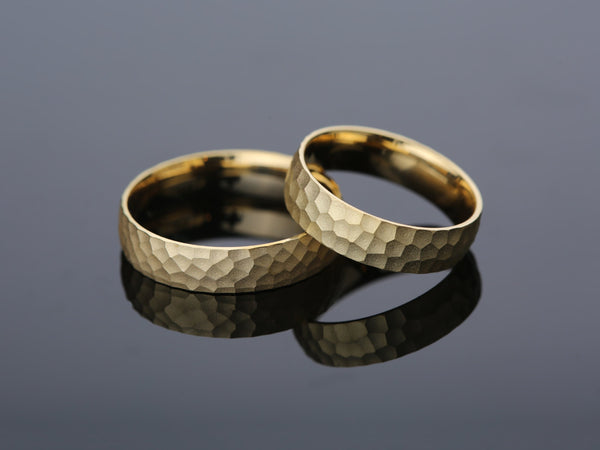 Textured gold wedding bands from jewelry firm