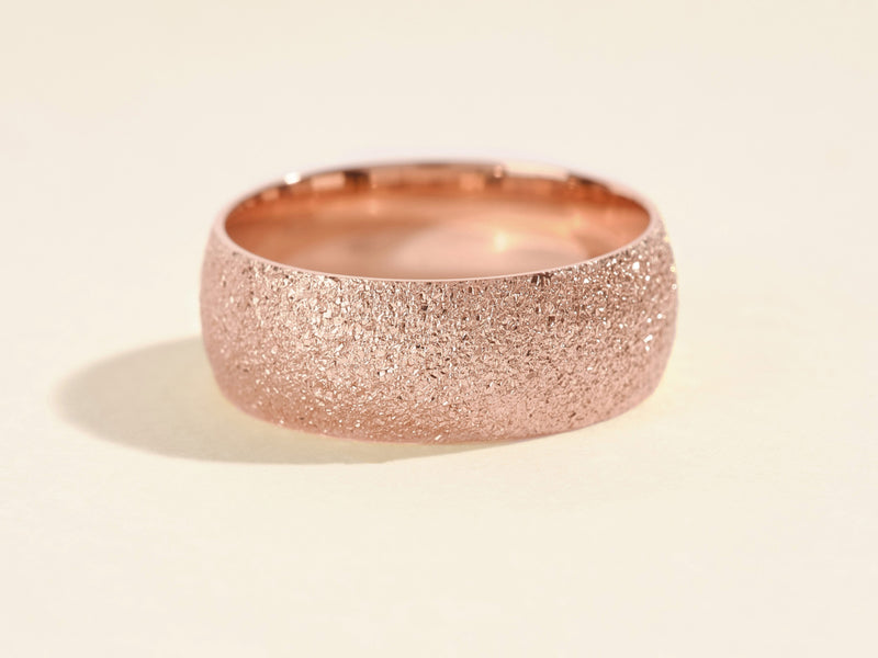 Textured rose gold ring for jewelry collection