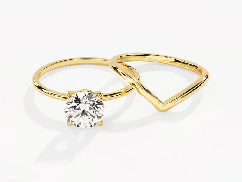Gold diamond engagement ring and wedding band set