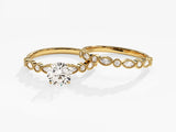 Gold diamond engagement ring set with marquise and round stones