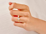 Diamond engagement ring set on a hand, jewelry photography
