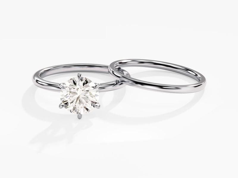 Diamond engagement ring and wedding band set from jewelry firm