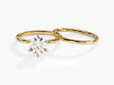 Gold diamond engagement ring and wedding band set