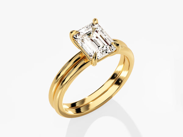 Emerald cut diamond engagement ring set in gold