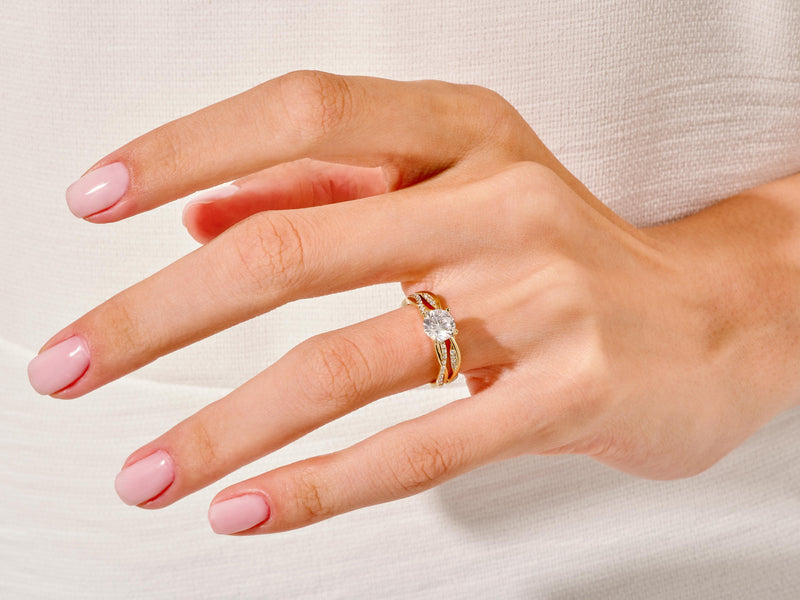 Gold diamond ring on a hand, jewelry product photography
