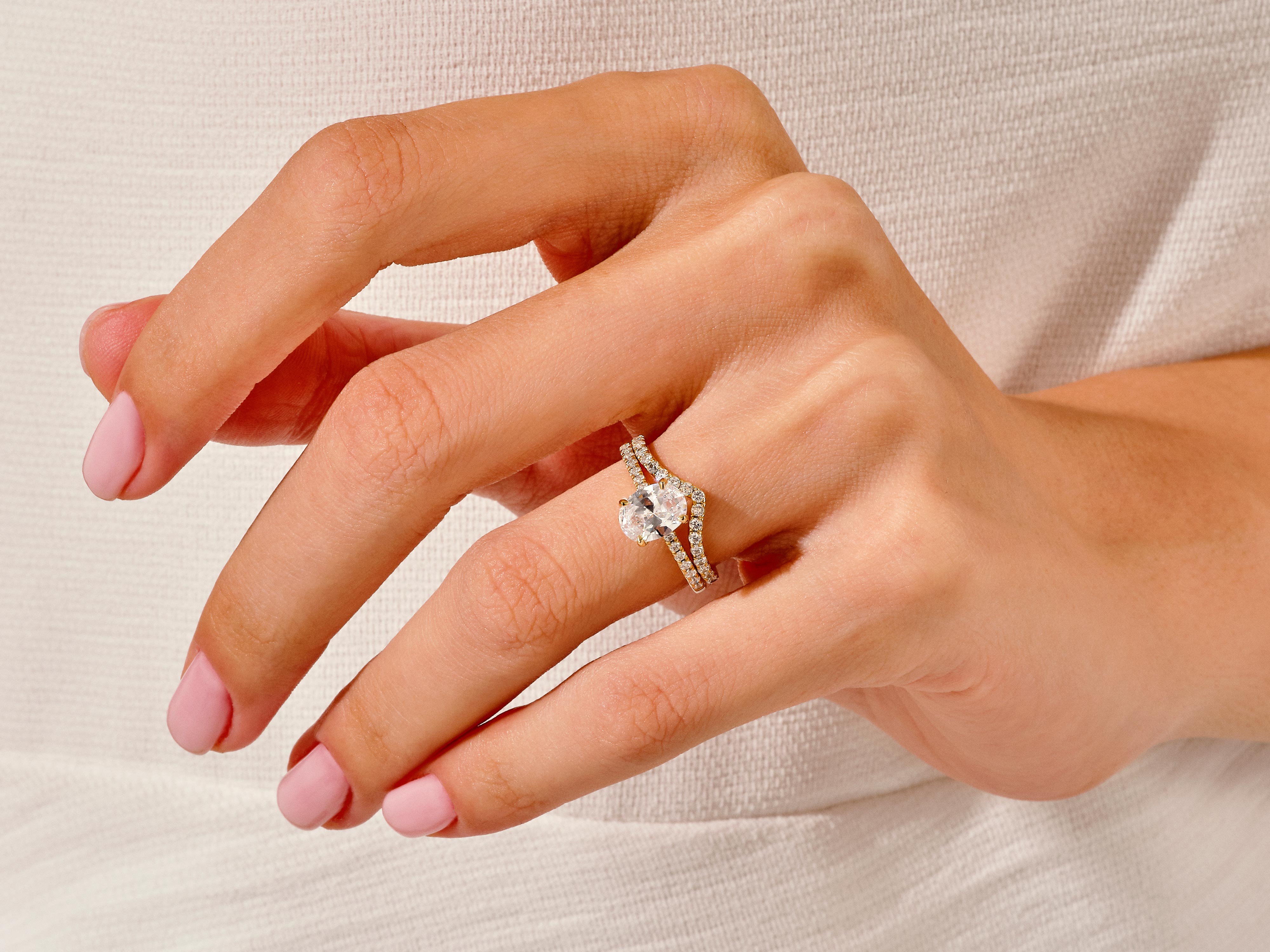 Diamond engagement ring on a woman's hand, jewelry