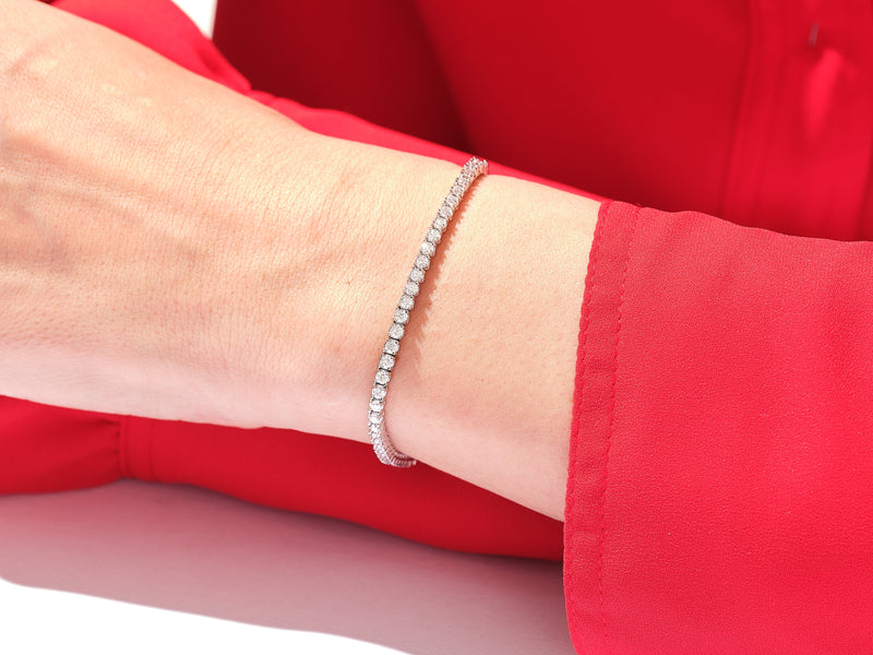 Diamond tennis bracelet on wrist, luxury jewelry