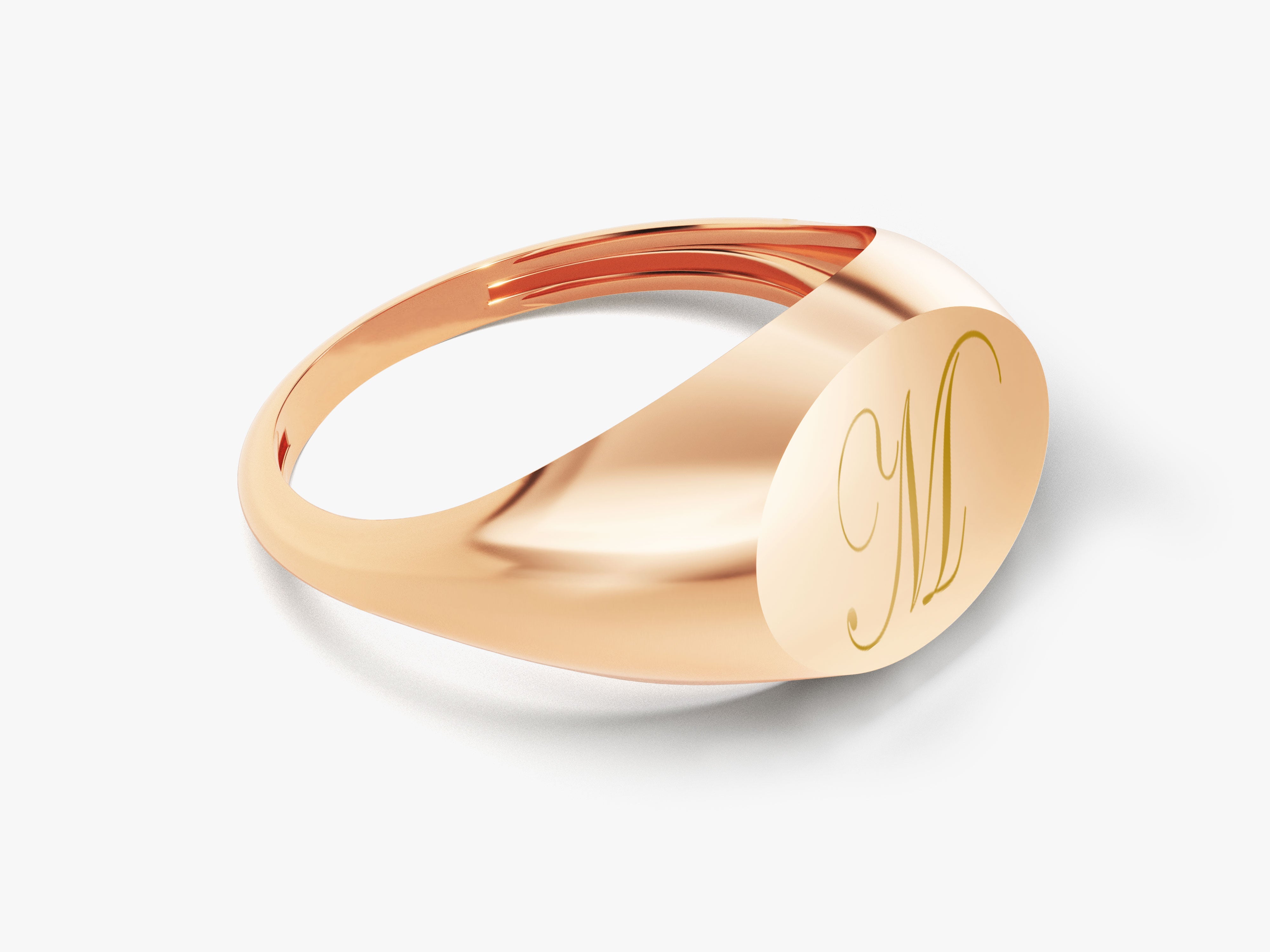 Rose gold signet ring with engraved initial M
