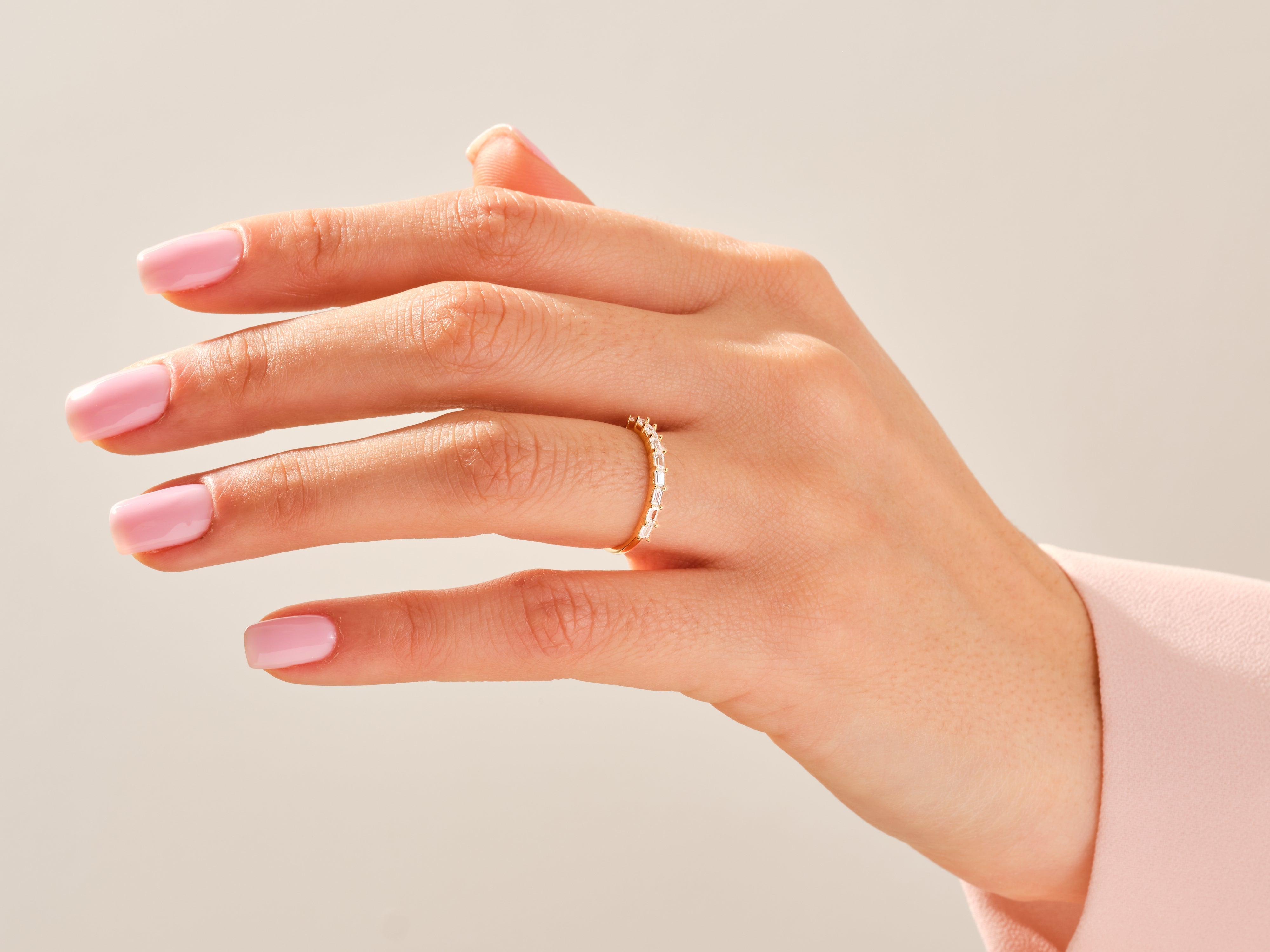 Diamond eternity ring on a hand, jewelry product photography