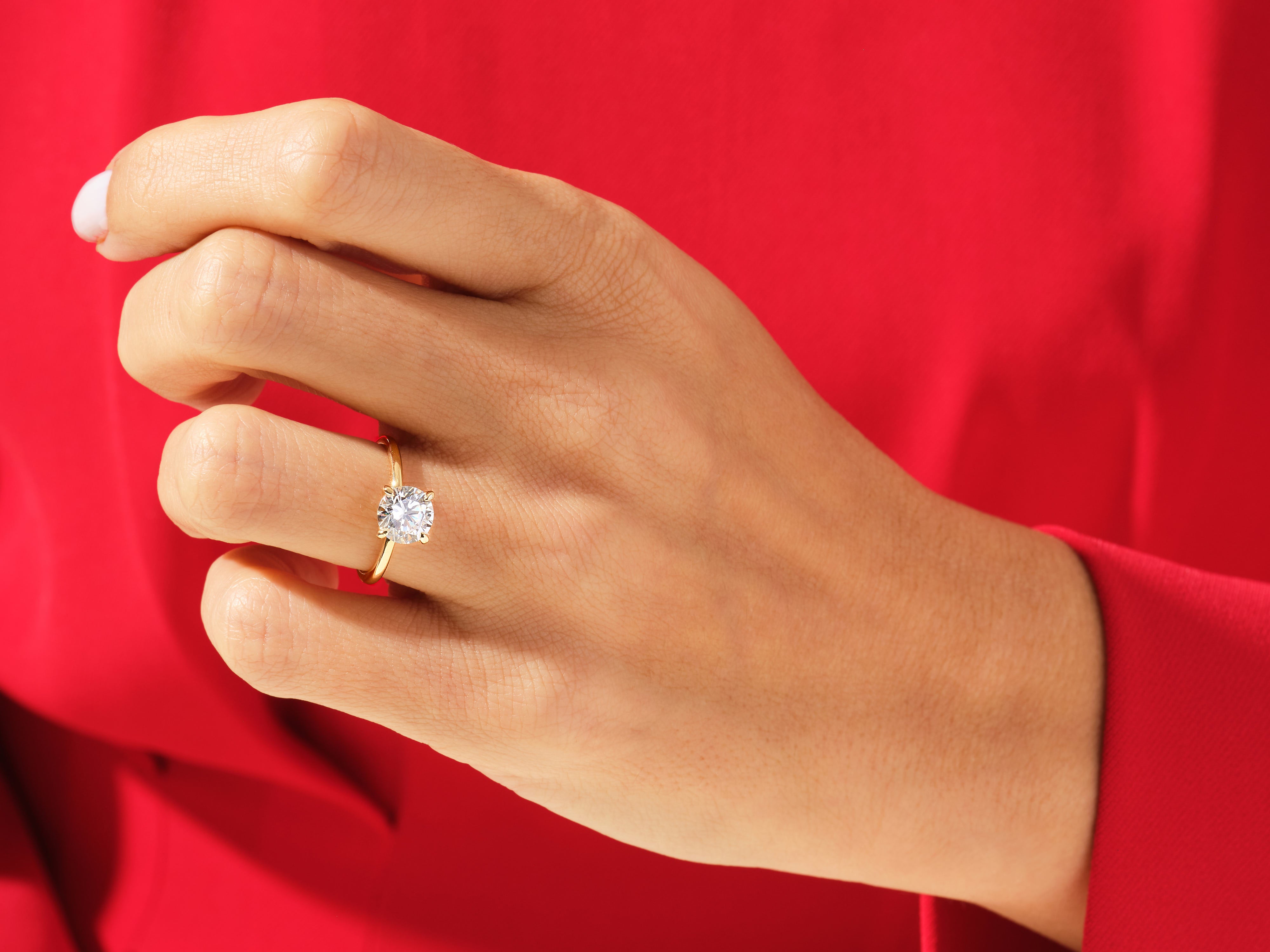 Diamond engagement ring on hand, luxury jewelry for women