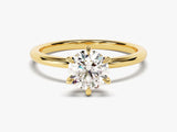 Gold ring with a sparkling diamond, fine jewelry