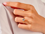Diamond engagement ring on a woman's hand, fine jewelry