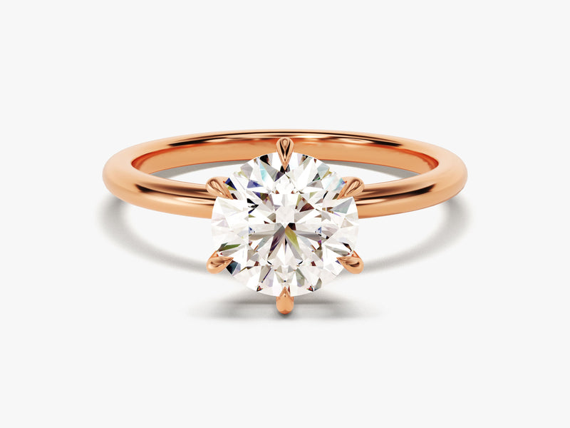 Rose gold engagement ring with a sparkling diamond
