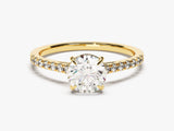 Oval diamond engagement ring with pave band