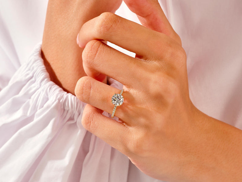 Diamond engagement ring on a woman's hand, jewelry