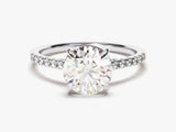 Oval diamond engagement ring with pave band