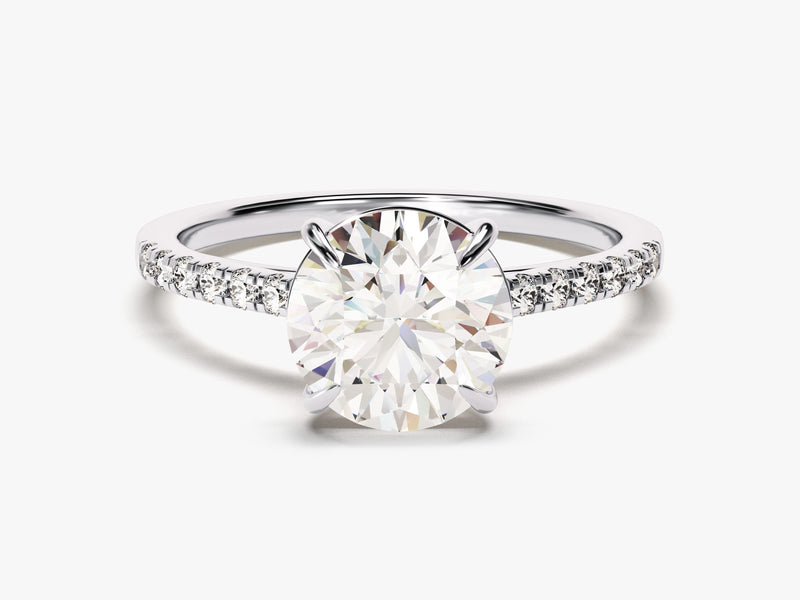 Oval diamond engagement ring with pave band