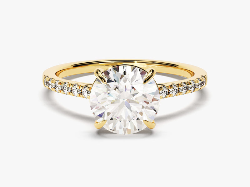 Oval diamond engagement ring with pave band