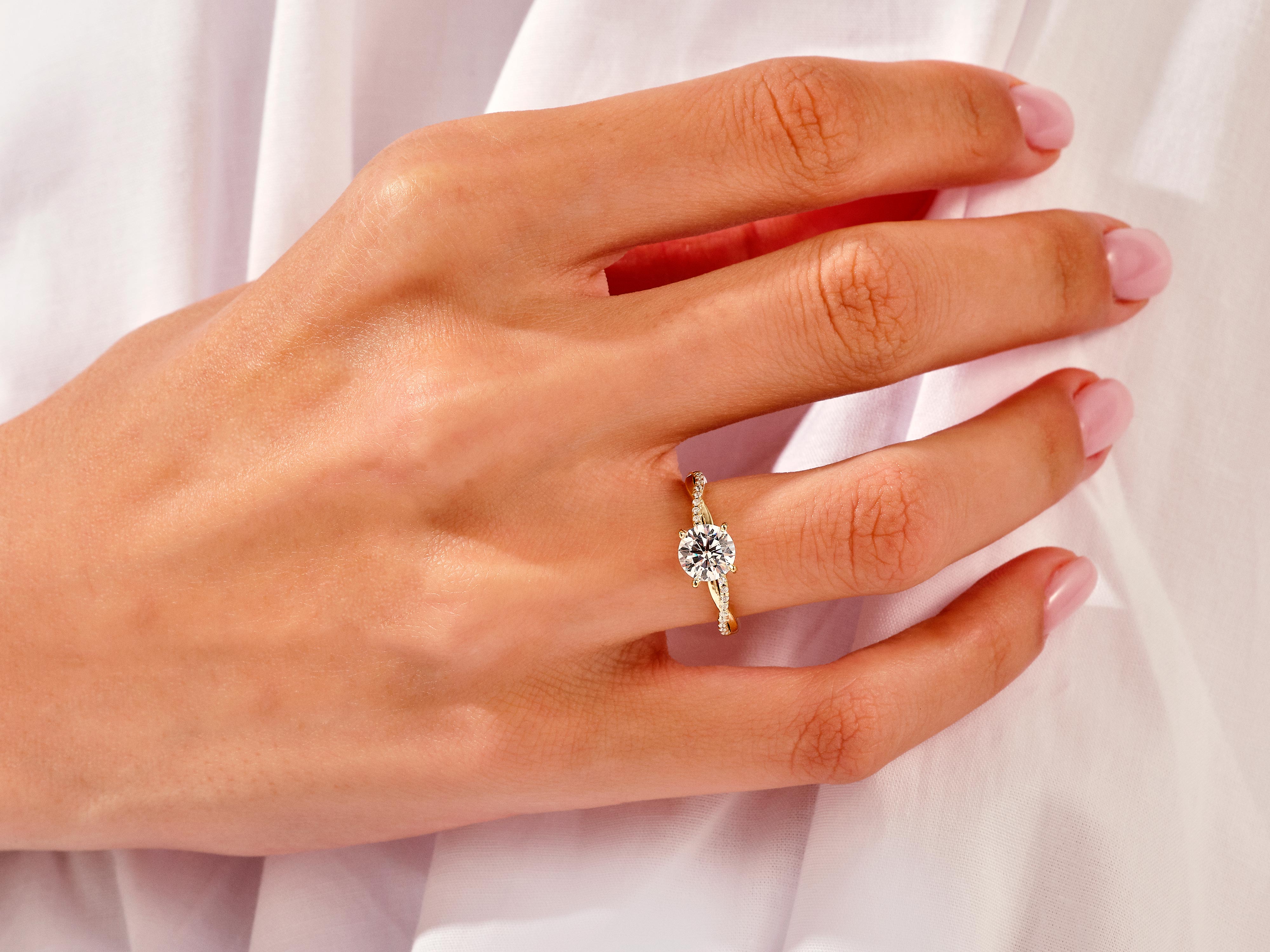 Diamond engagement ring on a woman's hand